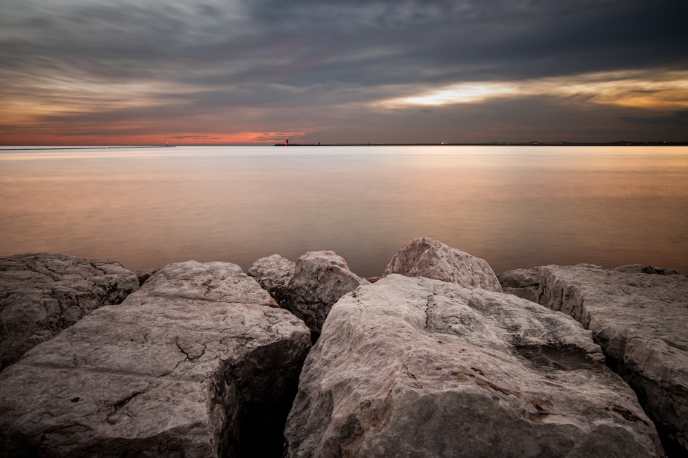 gray coastal rocks during daytime