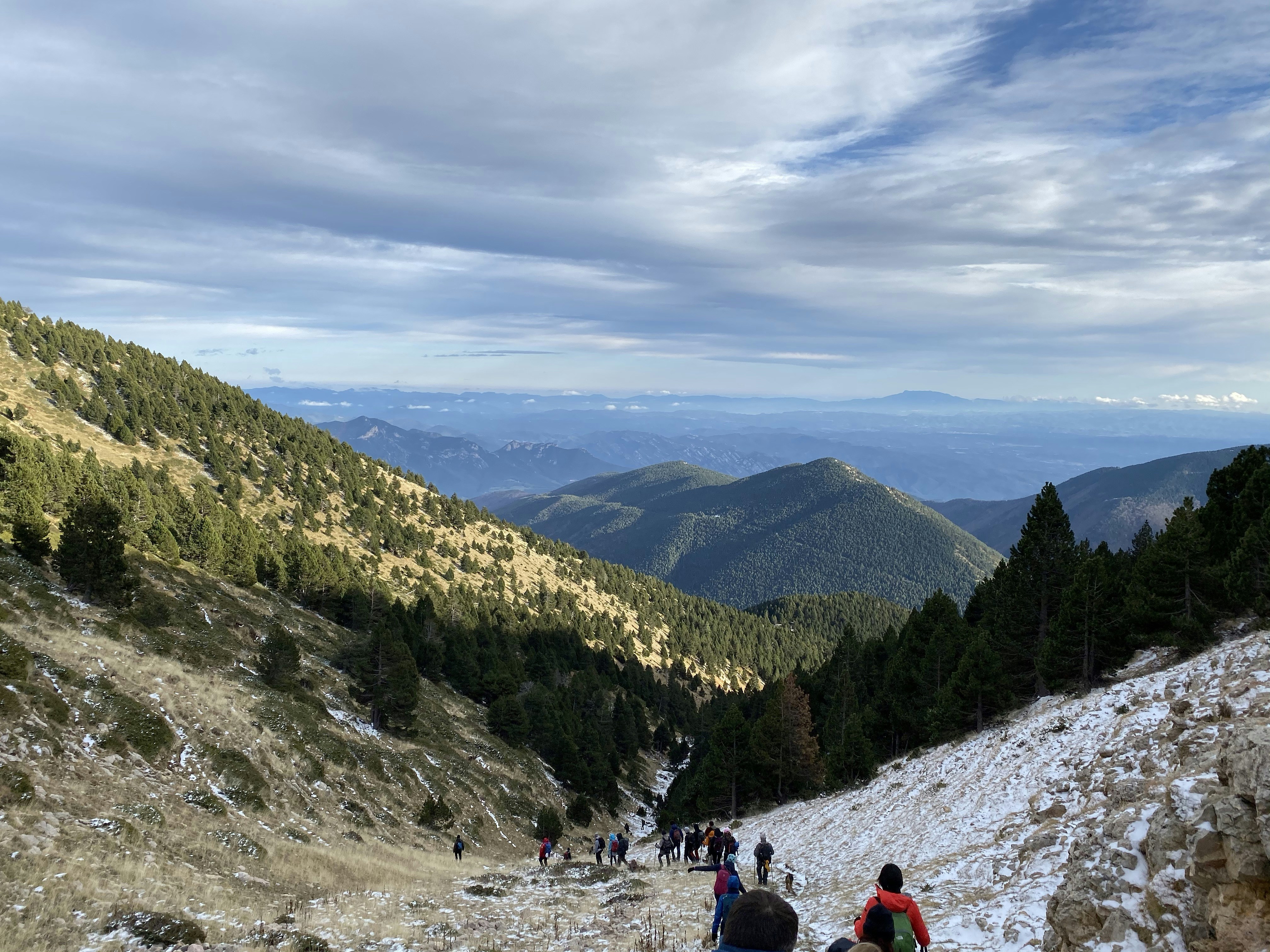 Mature hikers on mountain summit