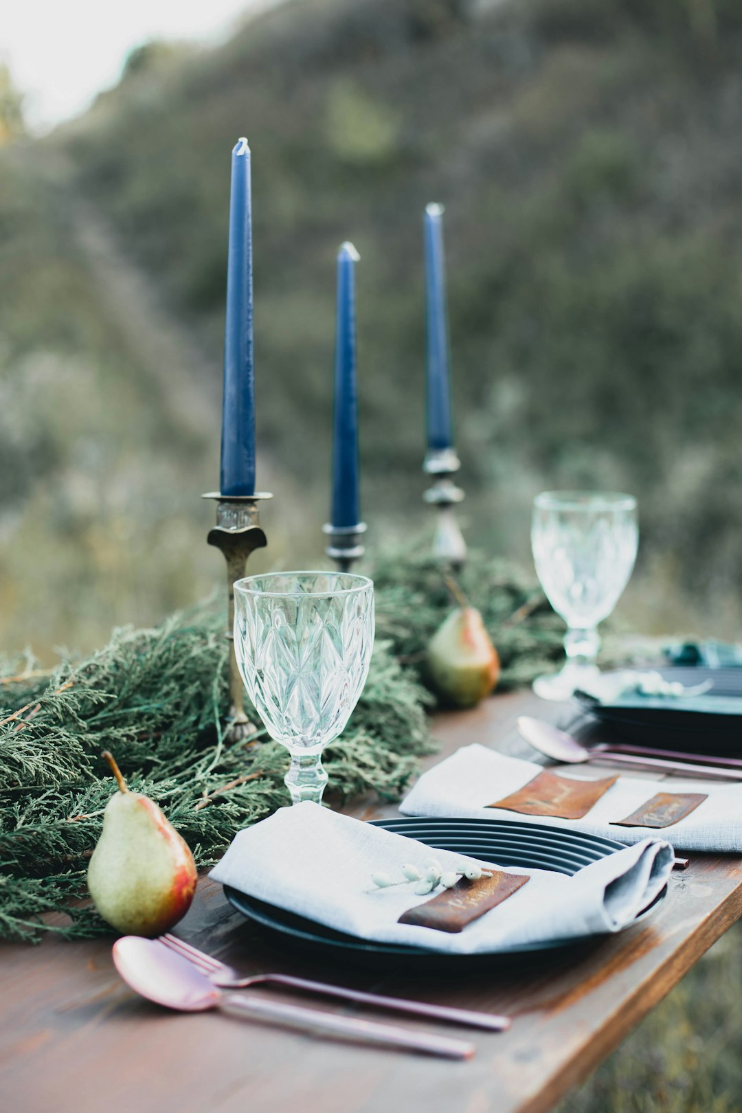 table with candles and dishes