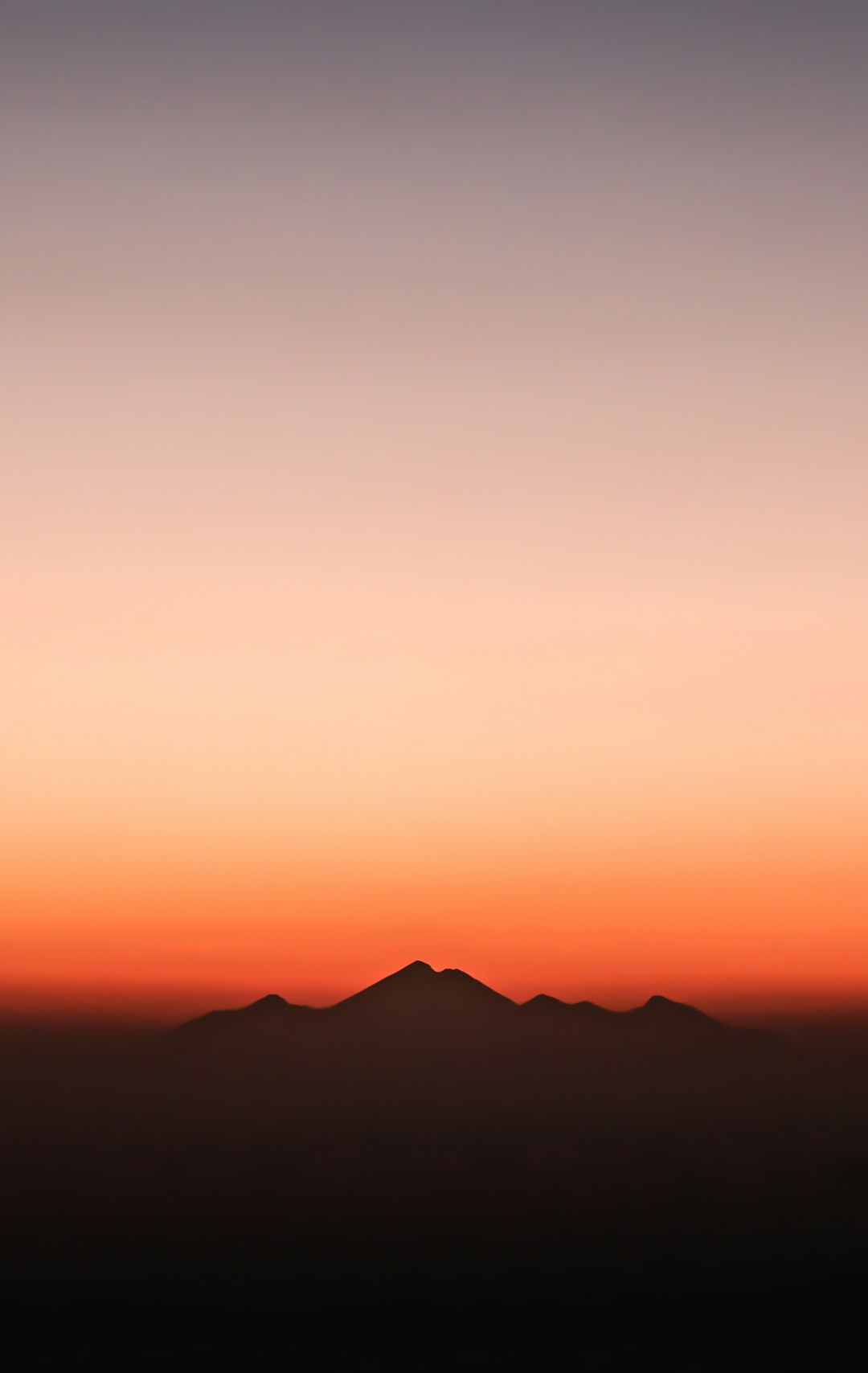 silhouette of mountain during golden hour