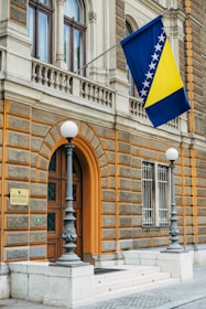 blue and yellow flag near door