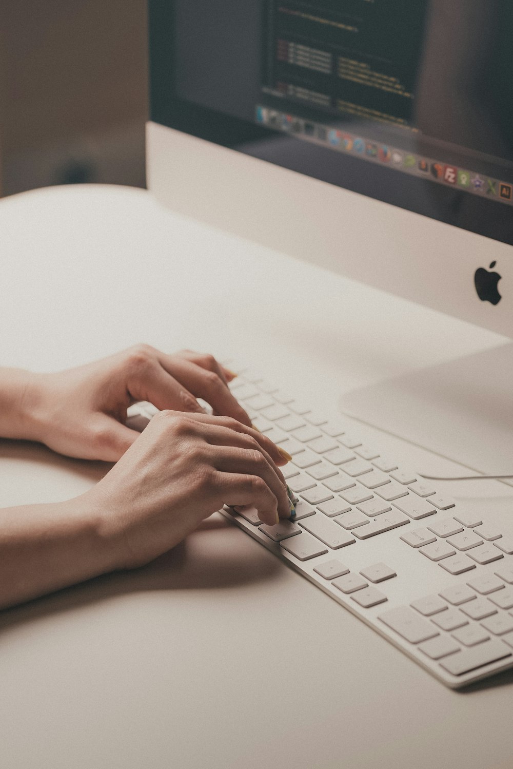 person using computer keyboard