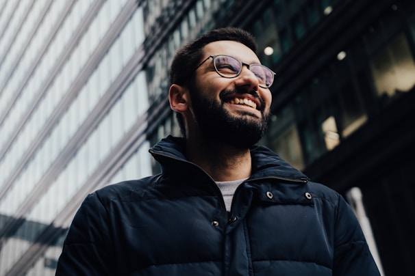 man in eyeglasses and jacket