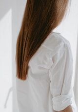 woman in white dress shirt