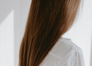 woman in white dress shirt