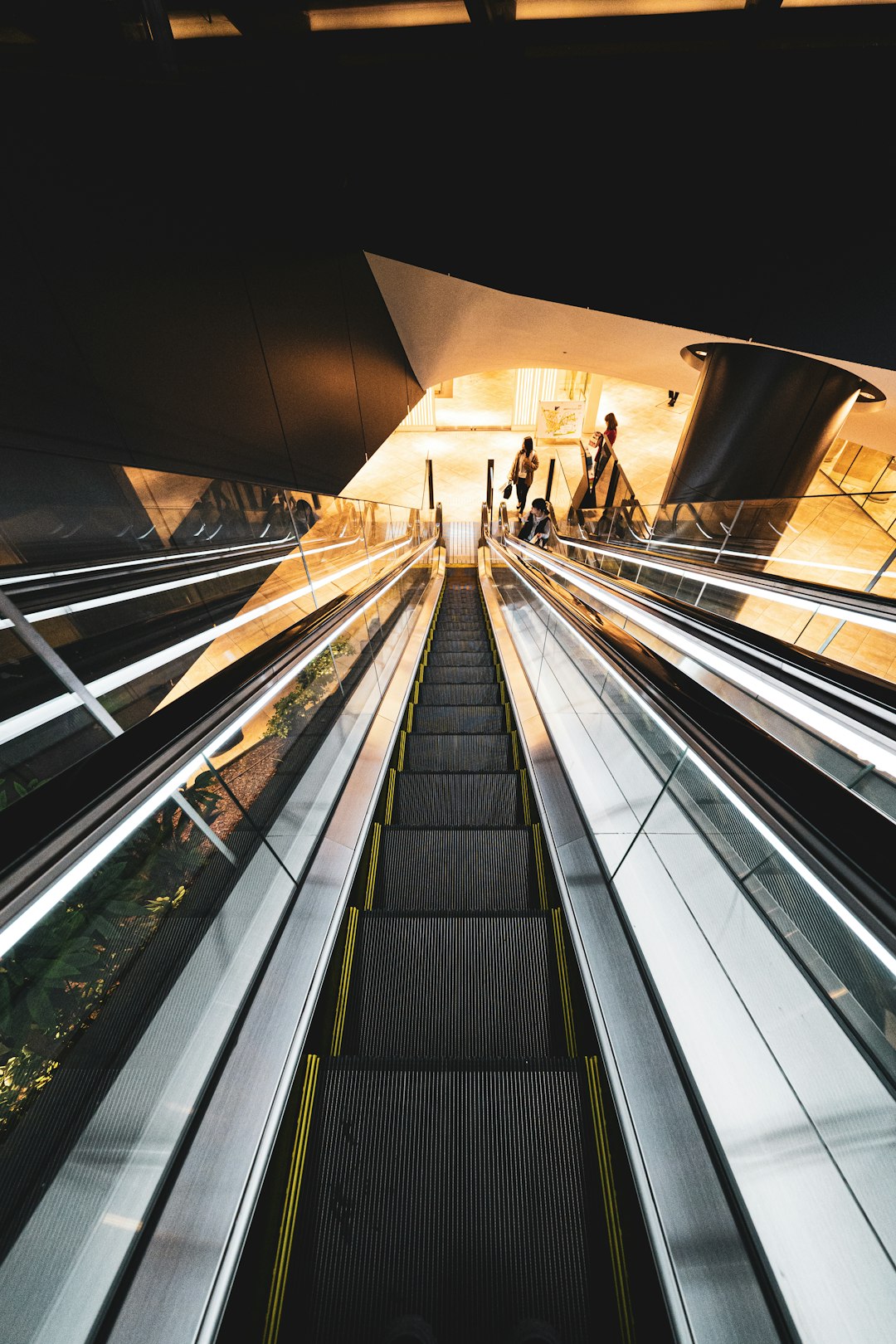 view photography of gray and black escalator