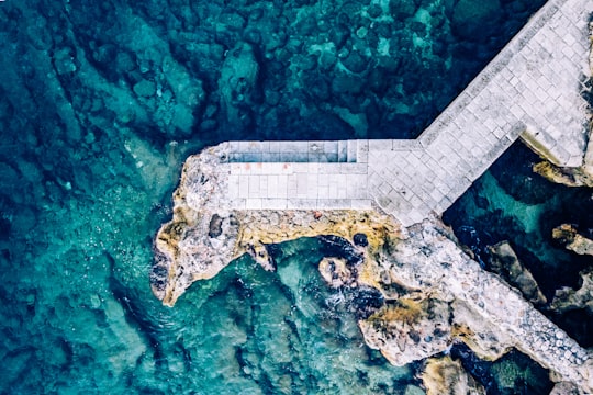 aerial photography of dock on body of water during daytime in Dubrovnik Croatia