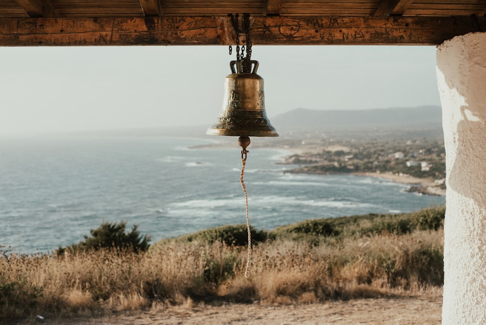 brass-colored bell