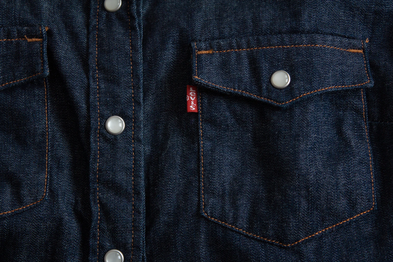 Levi's dark denim western shirt, red tab close-up