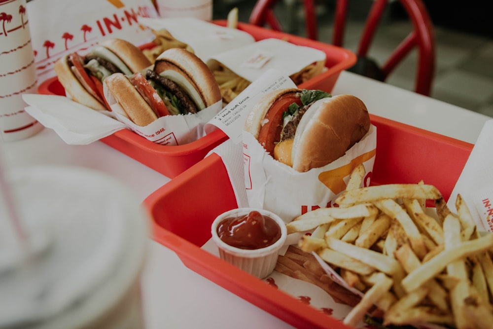 hamburger and fries with sauce