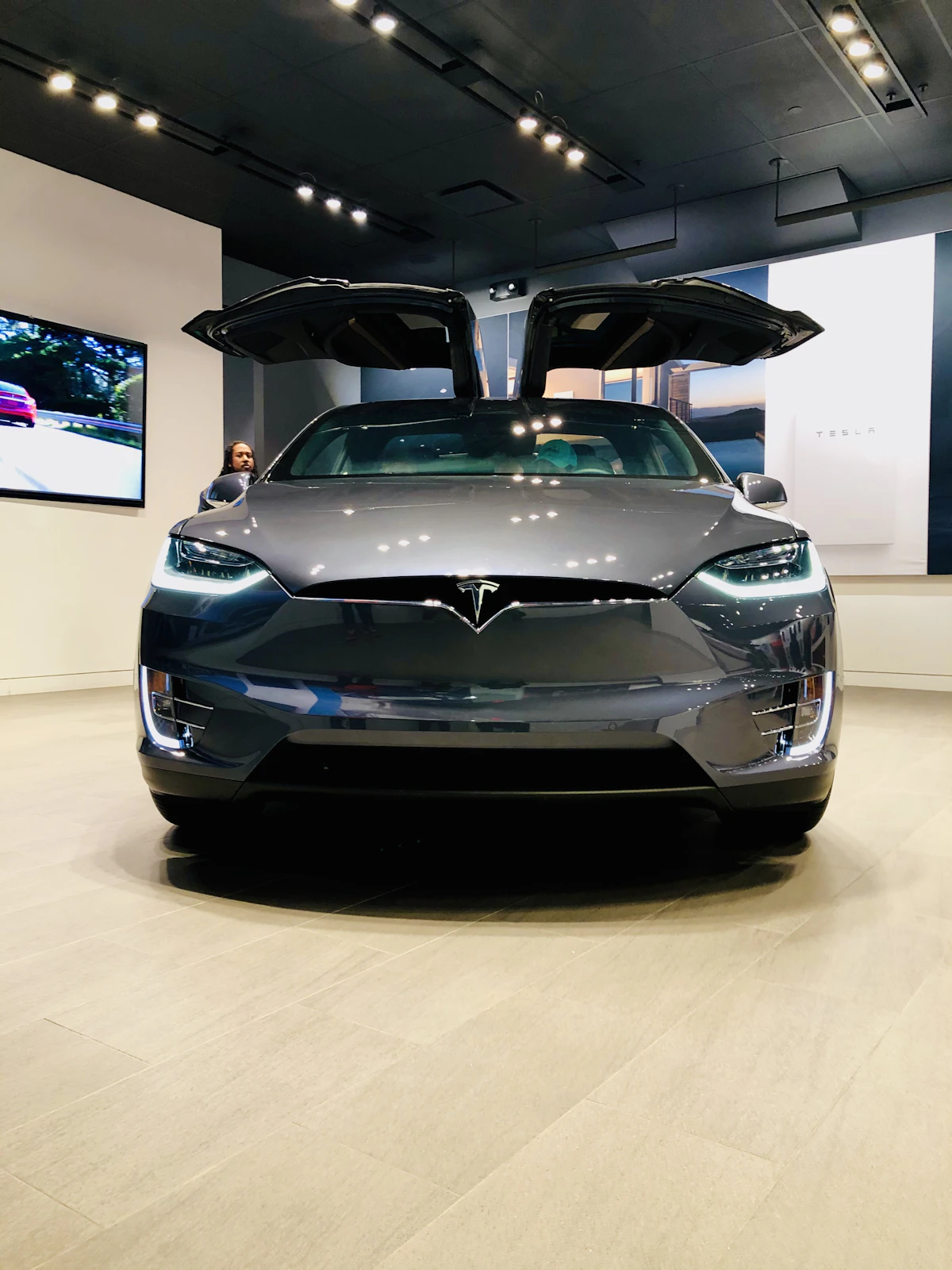 Silver Tesla Model S front end showing premium sedan design
