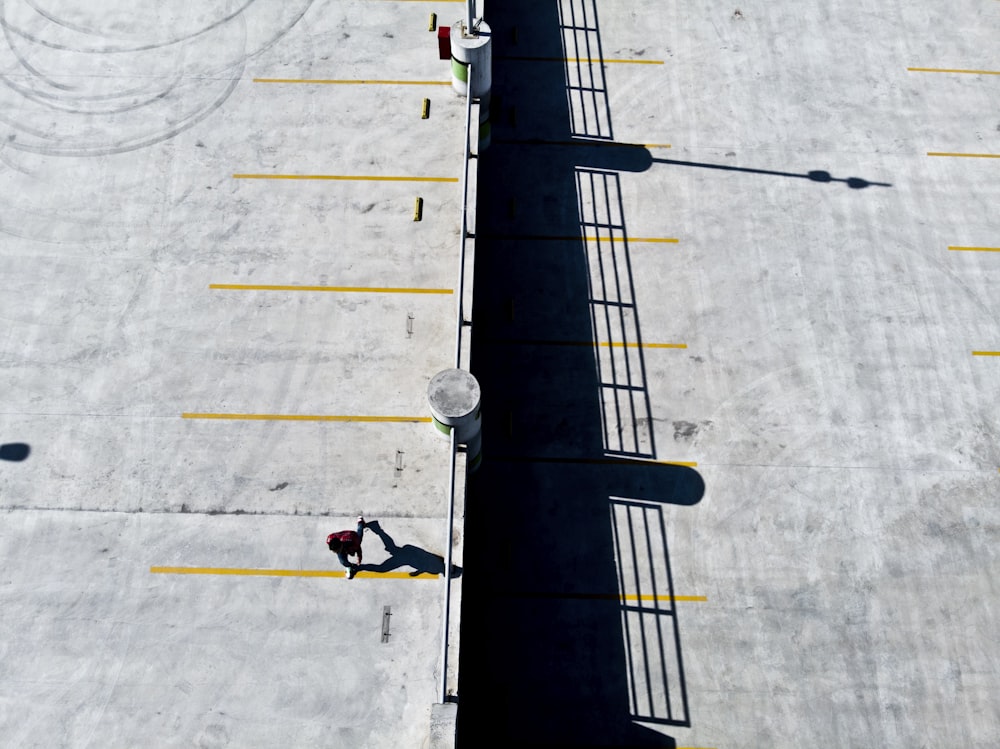 aerial photography of person walking on pathway