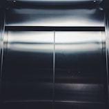 A close-up of an elegant automatic door in a commercial setting.