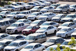 white sedan on the road