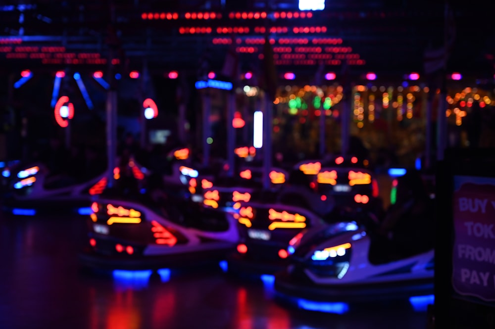 people riding bumper carts indoors