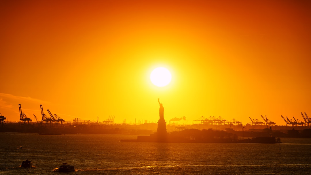 view photography of Statue of Liberty during golden hour