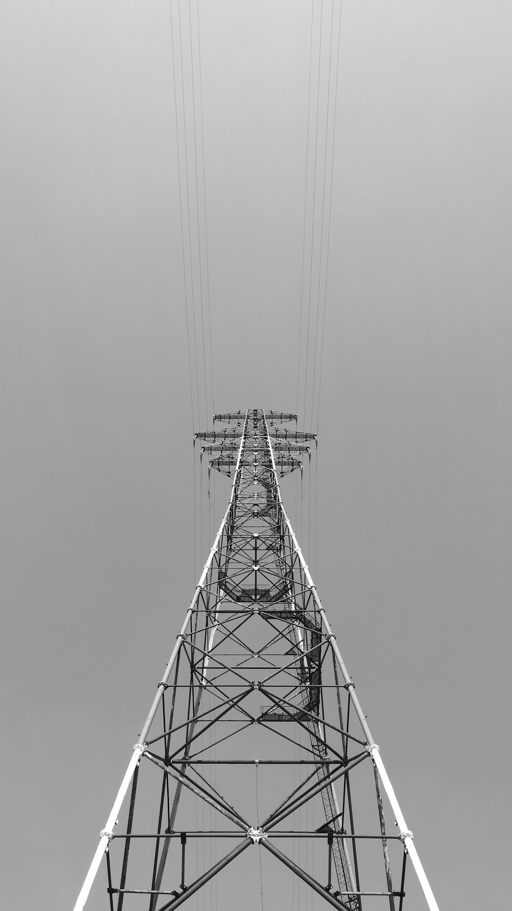 greyscale photography of metal tower