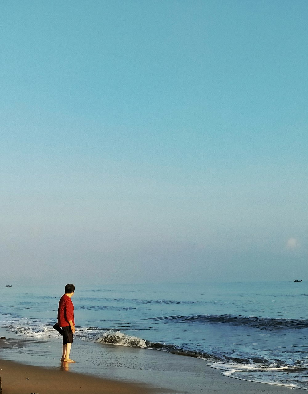 man standing on shore