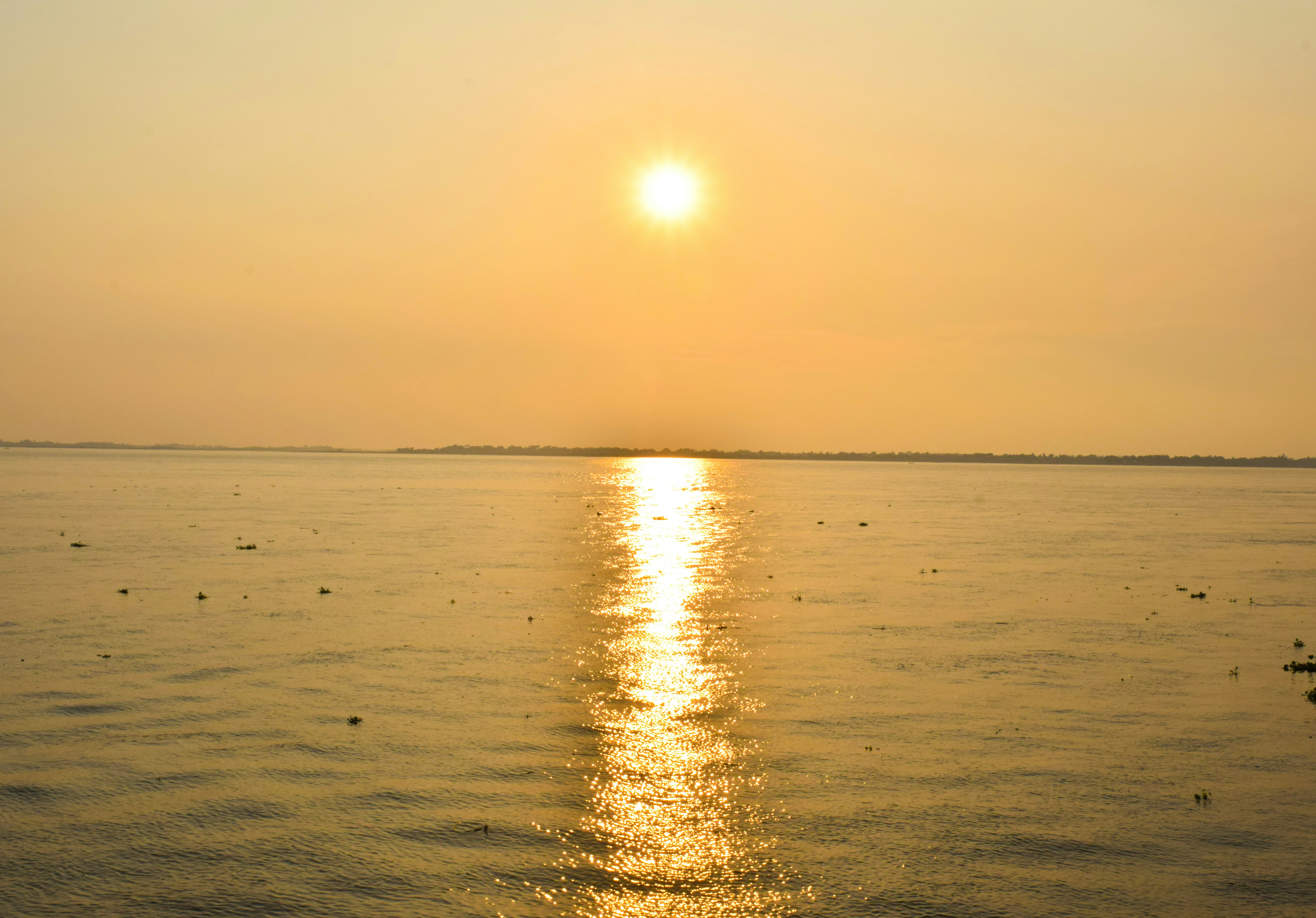 body of water during golden hour