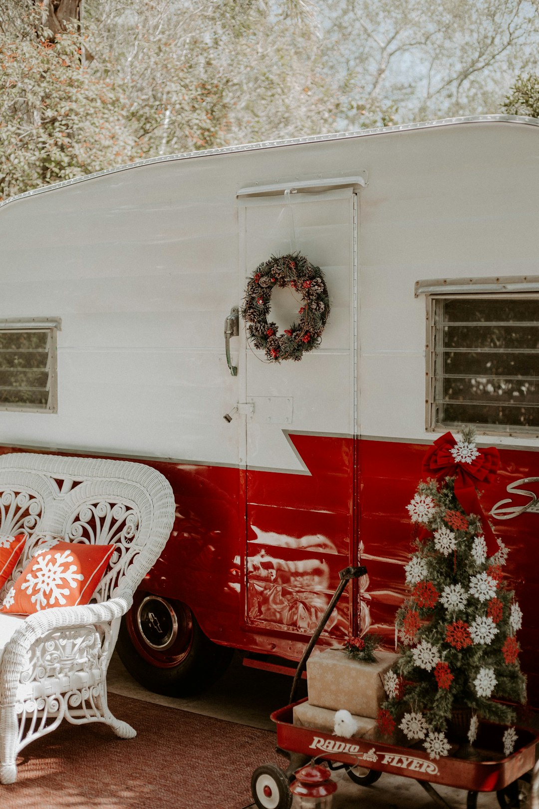 white and red camper trailer