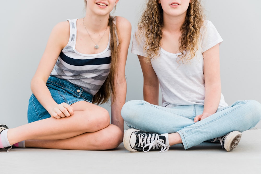 two women sitting near each other