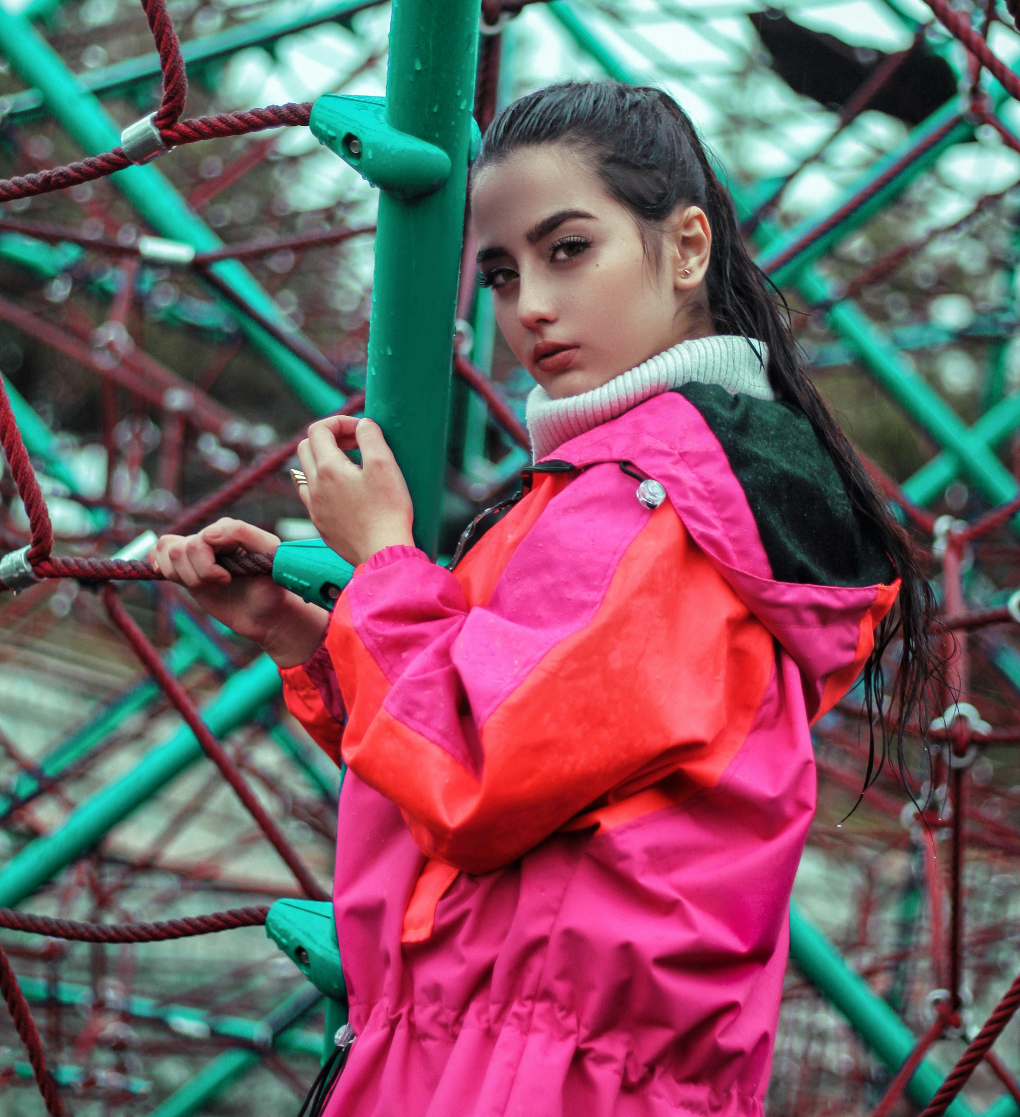woman wearing pink and red jacket