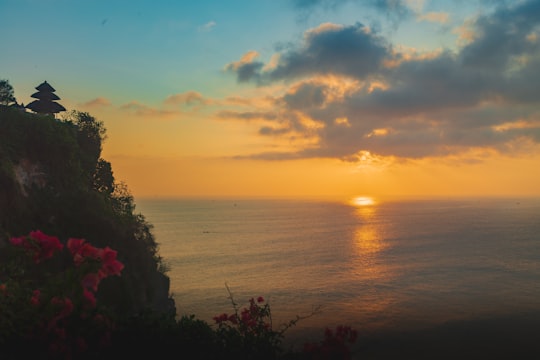 aerial photography of sea during sunset in Uluwatu Indonesia