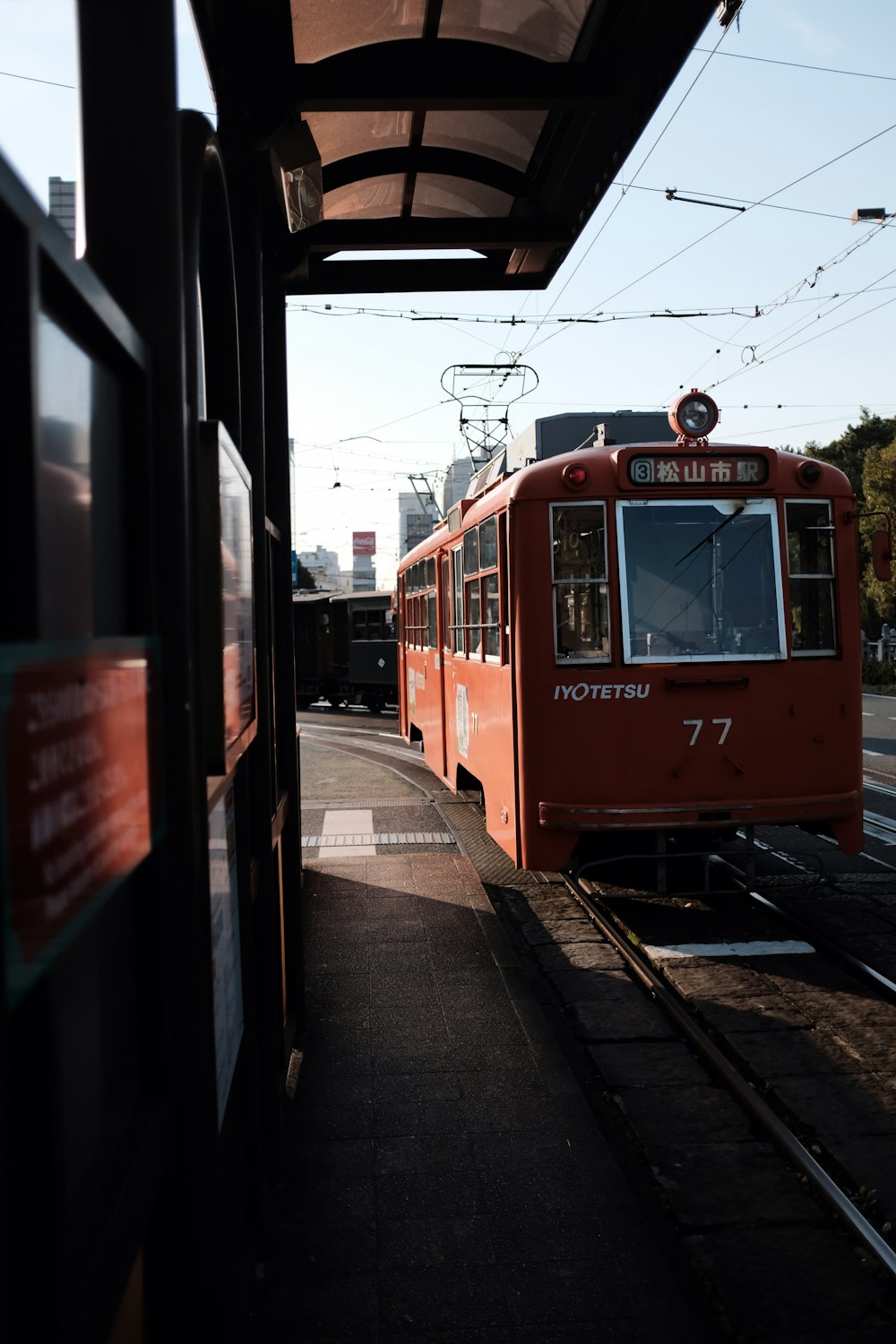 red train during daytime