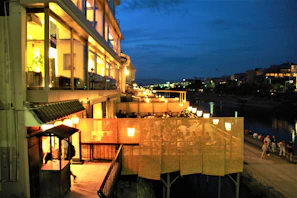 Evening scene of the restaurant filled with happy guests enjoying authentic Nusantara cuisine