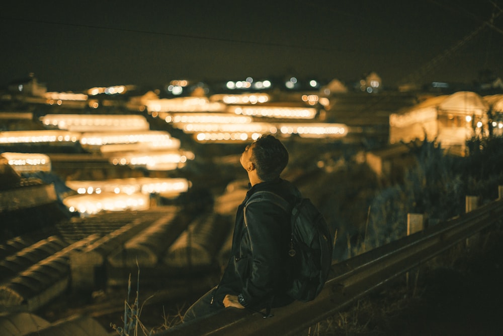 man wearing black backpack