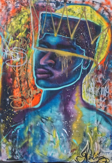 A vibrant mural showcasing a colorful urban portrait with dynamic brush strokes and graffiti elements.