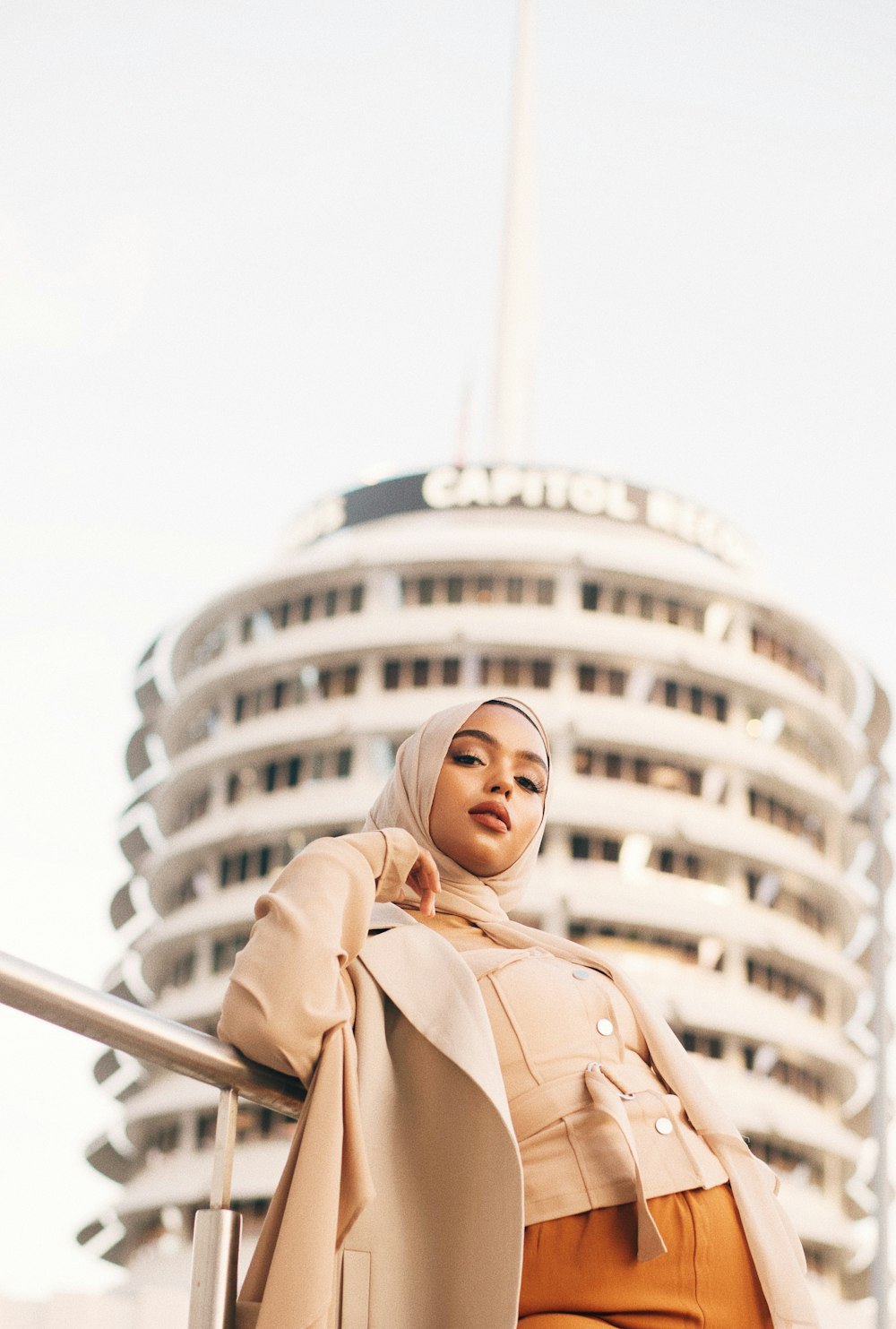 woman in coat and hijab