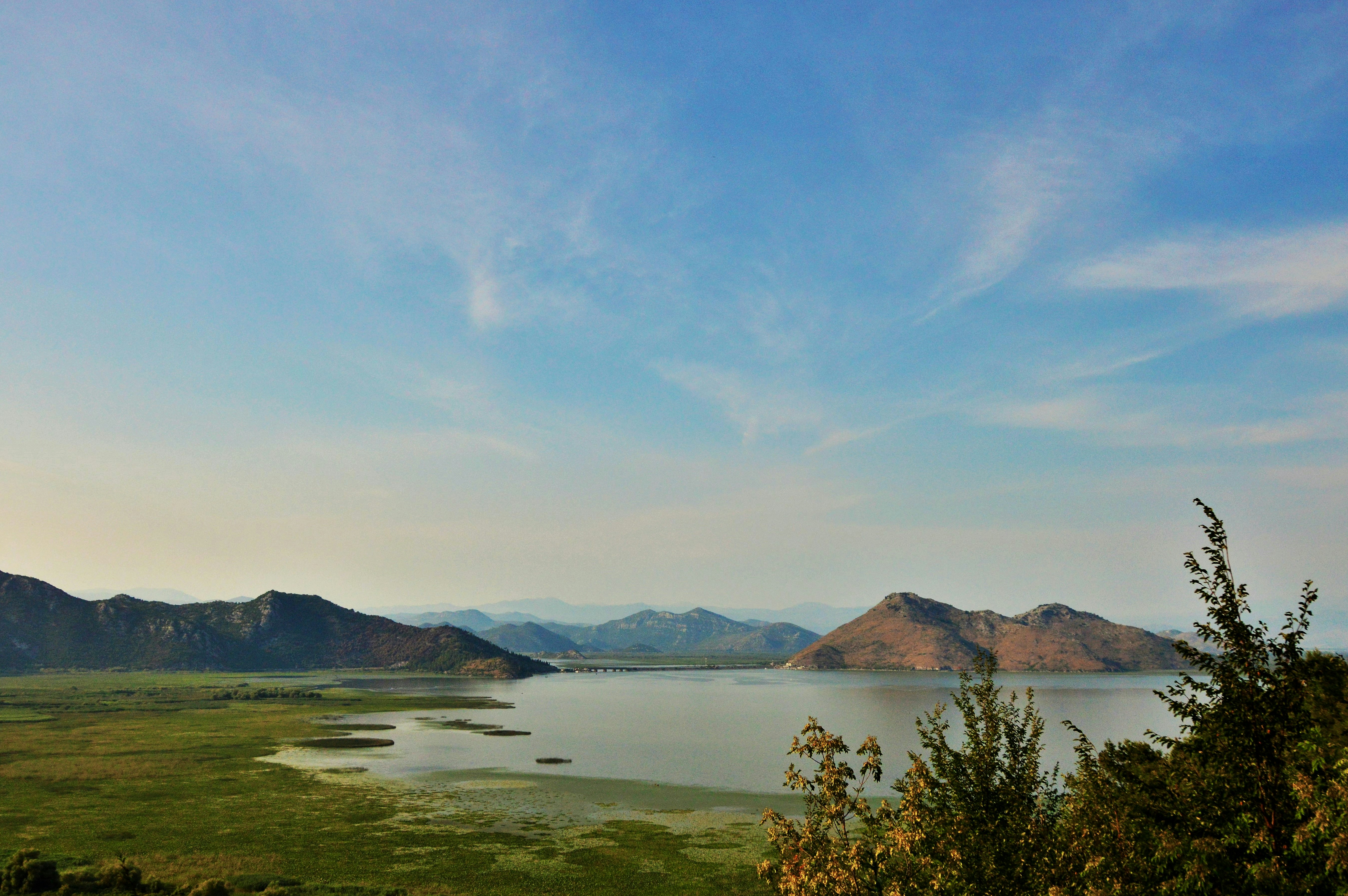 mountains near body of water during daytime