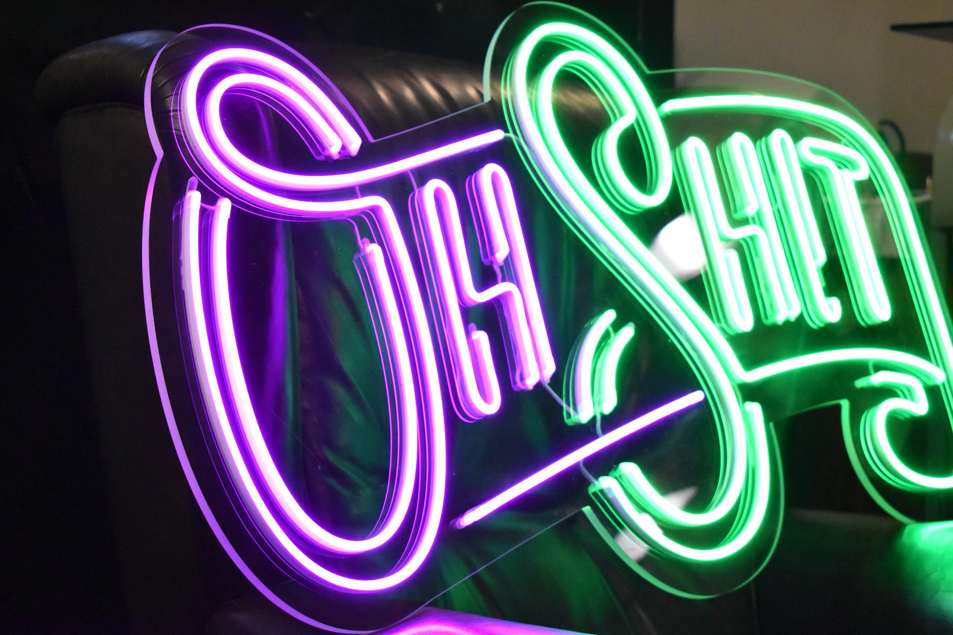 shallow focus photo of neon light signage