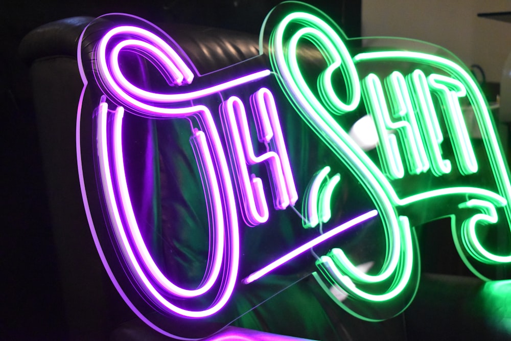 shallow focus photo of neon light signage