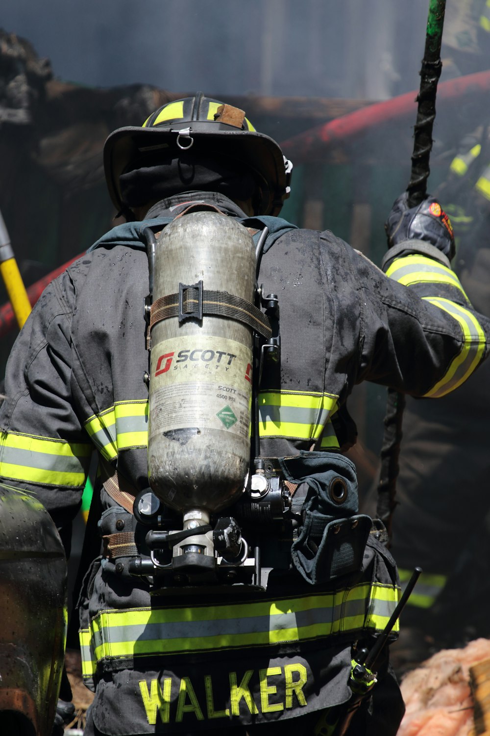 shallow focus photo of firefighter