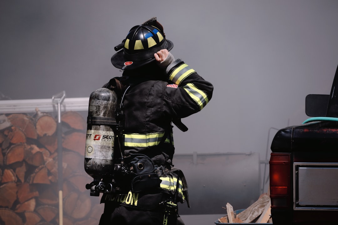 shallow focus photo of firefighter