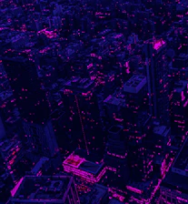 an aerial view of a city at night