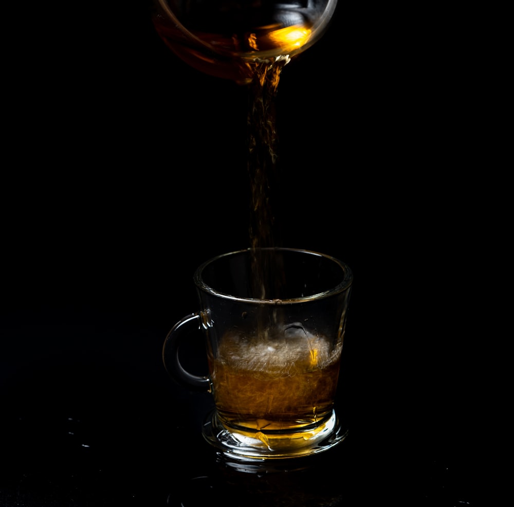 clear glass mug with wine