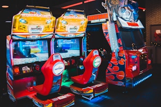 red and multicolored arcade machines