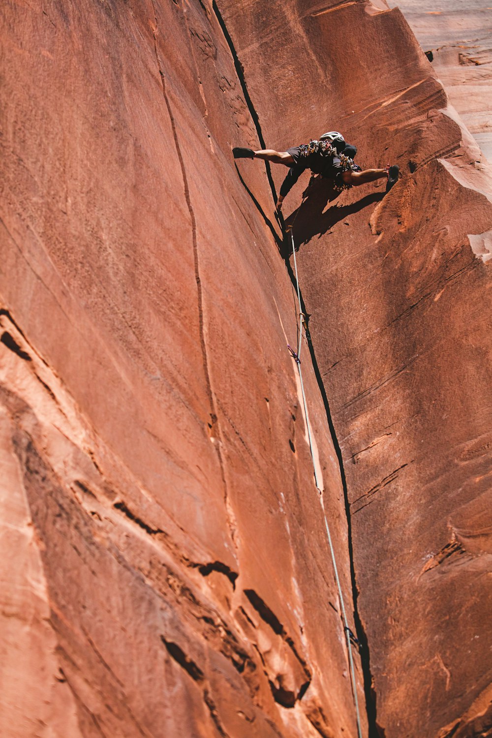 person climbing on wall