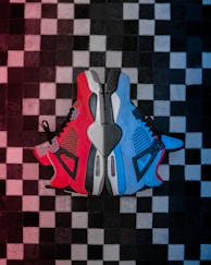 red and blue Air Jordan basketball shoes