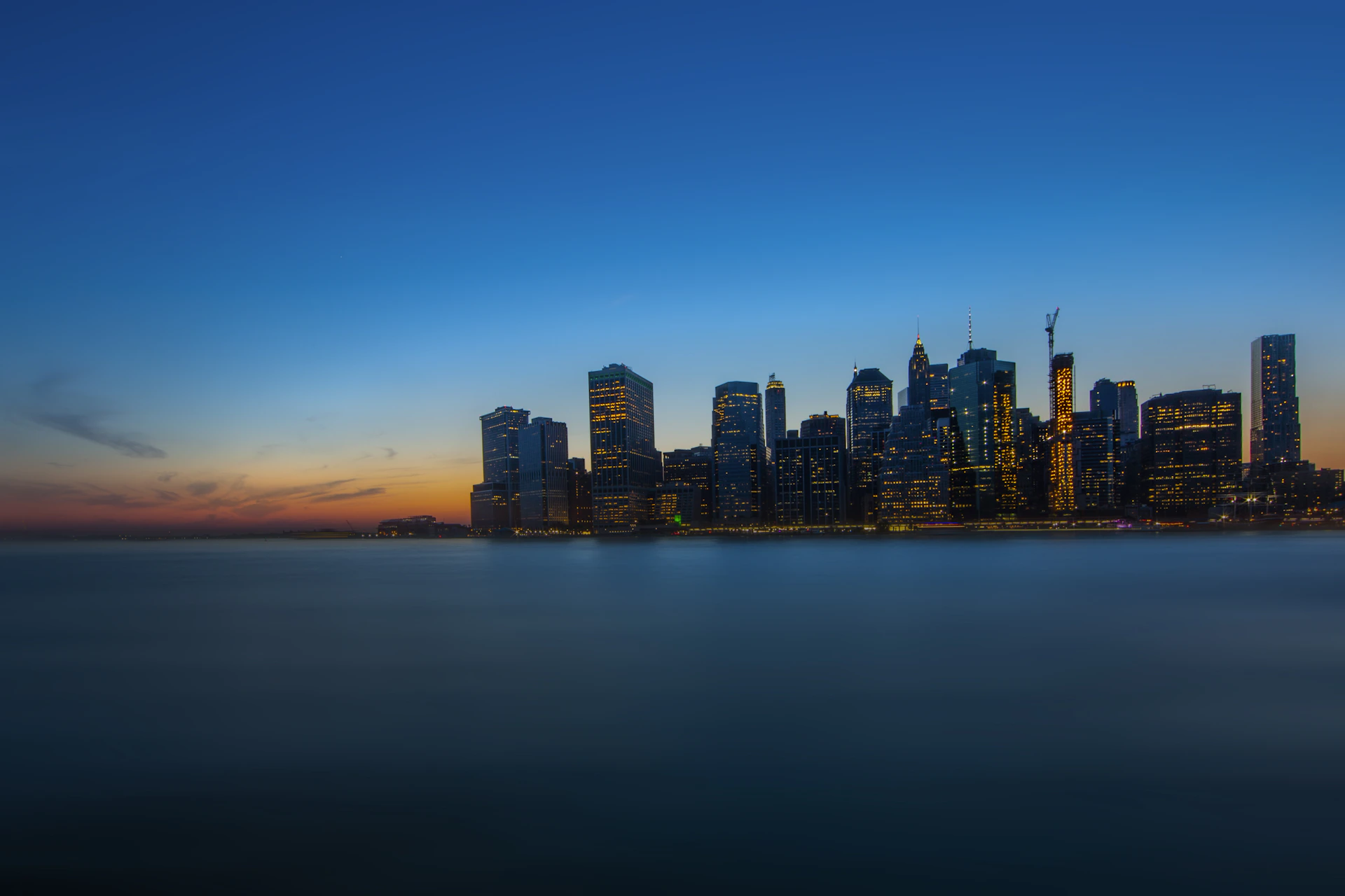 a view of a city at night from across the water