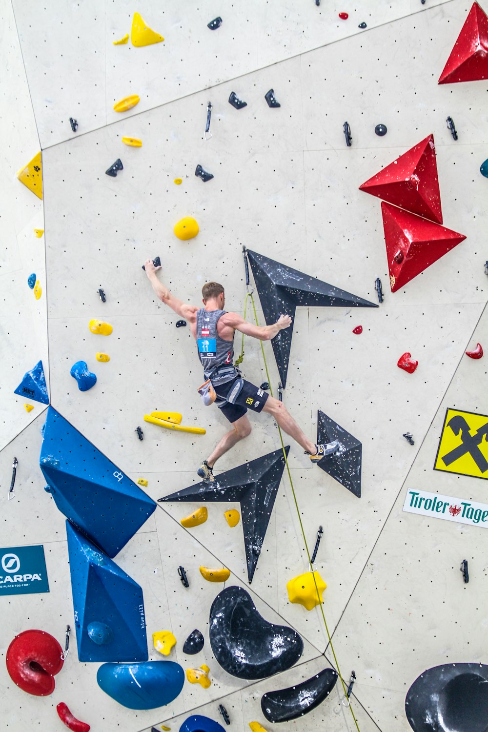 man climbing wall