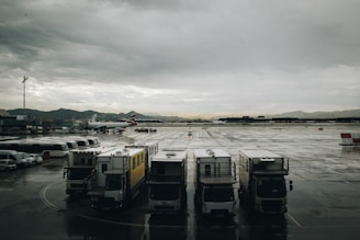five white trucks