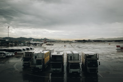 five white trucks