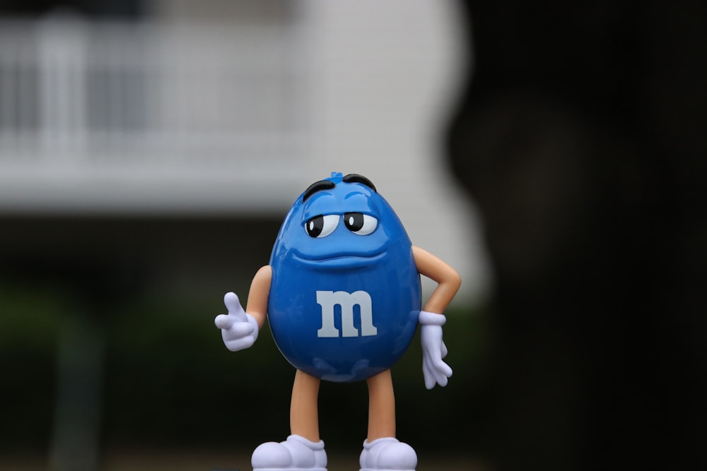 a close up of a toy figurine on a table