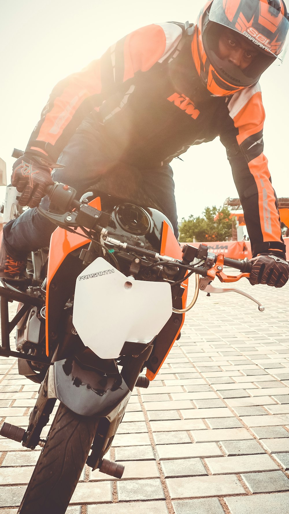 man riding motorcycle doing exhibition during daytime