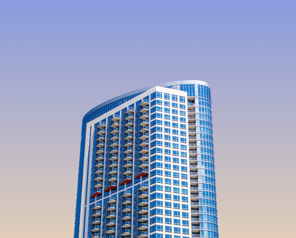 blue high-rise building during daytime