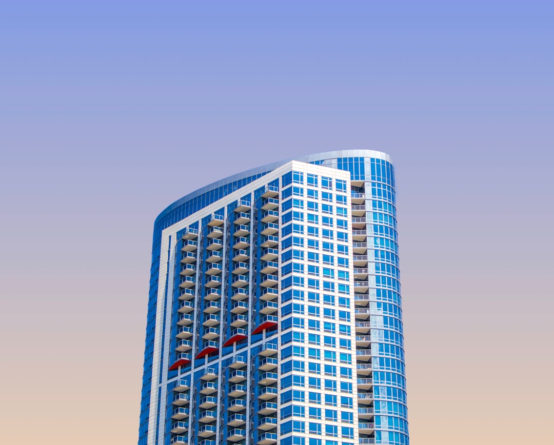 blue high-rise building during daytime